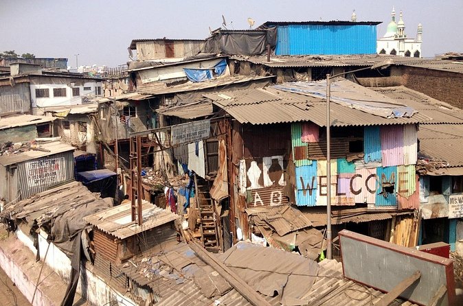 Dharavi Slum Tour with Home Visit Group Cruise Excursion - The local home visit: what you learn when the scale changes