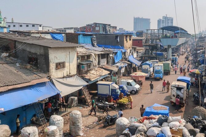 Dharavi Slum Tour with Home Visit Group Cruise Excursion - How long it really takes: 4 hours with a focused walking segment