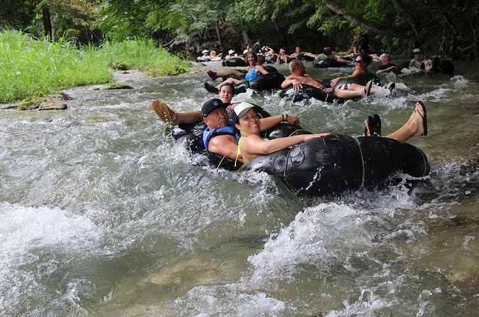 Falmouth Shore Excursion: Dunns River Falls and River Tubing Tour - White River inner tubing: gentle current, big fun, and real safety support