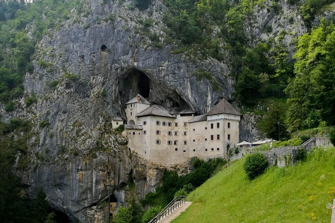Group tour to Postojna Cave from Koper - with unique cave train - Predjama Castle Photo-Stop: The View Is Famous, the Visit Is Not