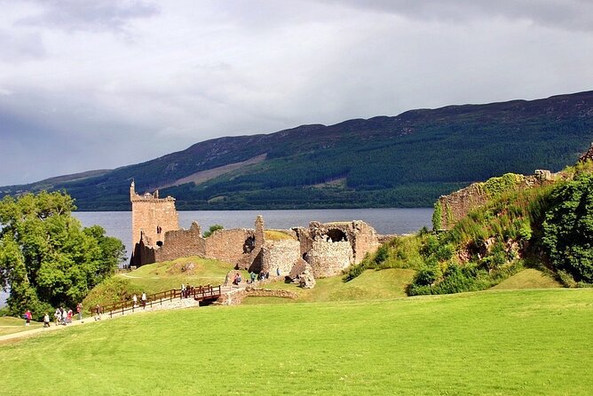 Loch Ness , Outlander , Inverness Castle , Clava and Culloden - Highland cows and Beauly Priory before the big loch
