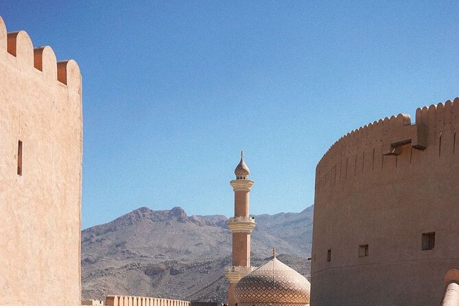 Muscat Shore Excursion: Private Nizwa Day Trip - Jabrin Castle on a hilltop: murals, carved doors, and hidden-room luck